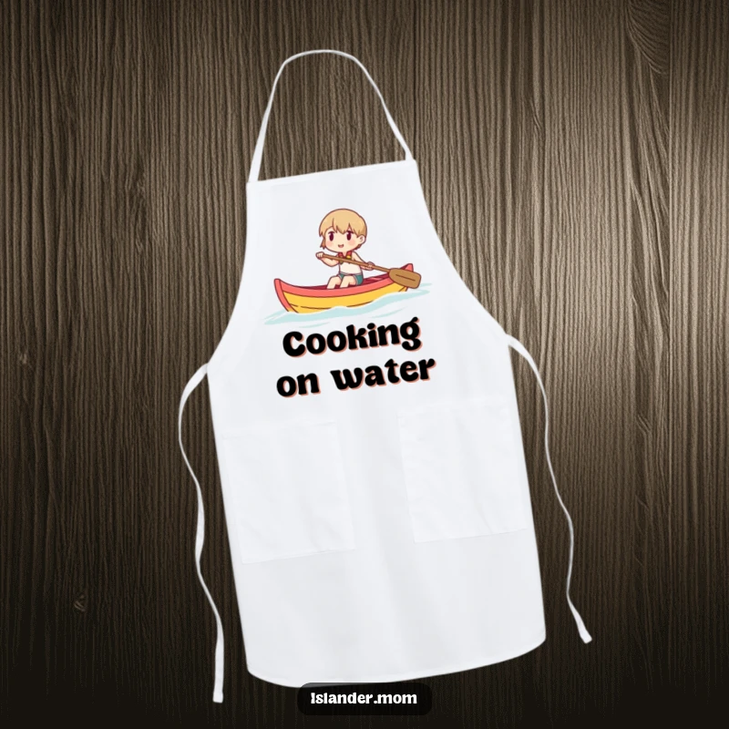Funny kitchen apron showing a character happily paddling a small outrigger canoe, perfect for bringing adventure to meal prep.