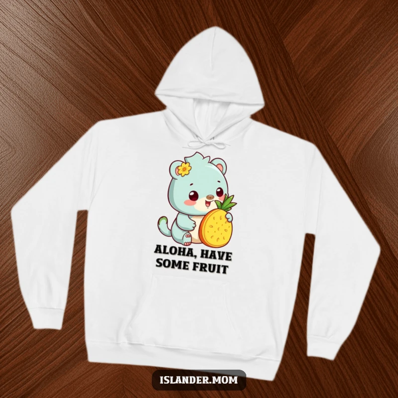 Funny Hoodie: Cozy hoodie with a kawaii islander animal offering pineapple, blending tropical warmth with lighthearted charm.