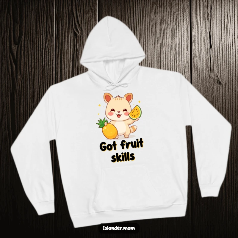 Funny hoodie showcasing a skilled animal character juggling exotic fruits, embodying fun, talent, and a warm, fuzzy feeling.