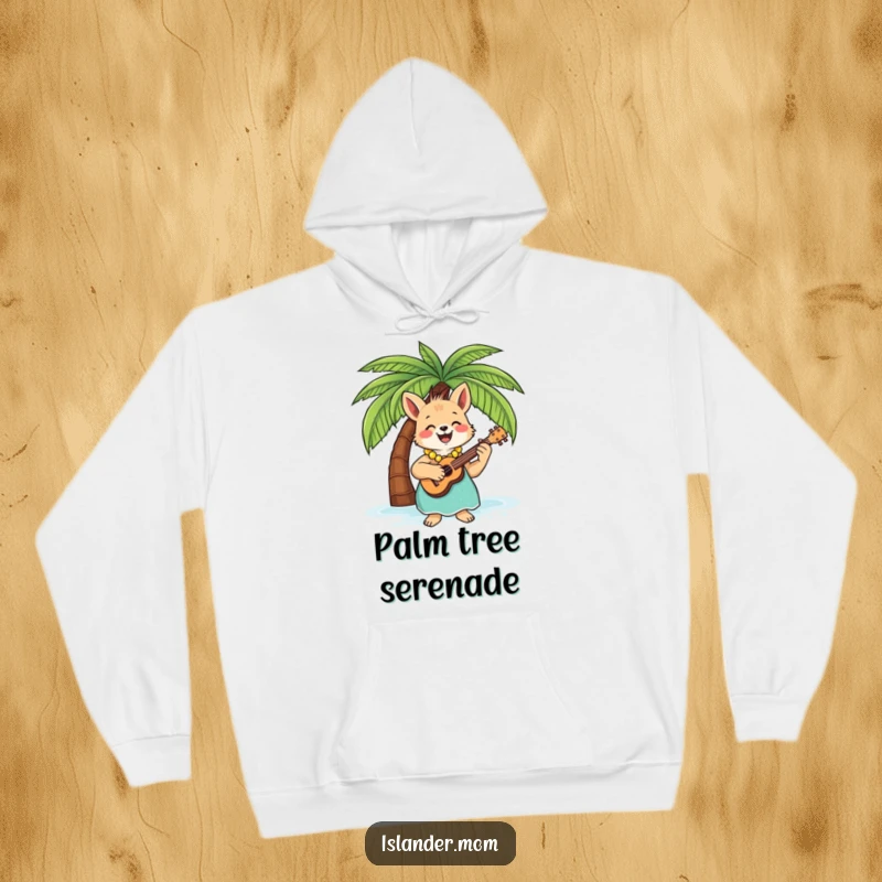 Funny Hoodie illustrating a cheerful islander mom animal playing a ukulele under a scenic palm tree, radiating good vibes.